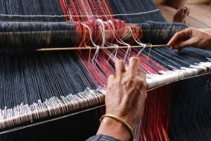 Weaving in Ba Na village travel with laos tour package