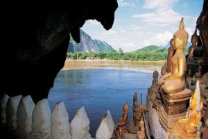pak ou caves buddha statues exploration duing laos tour